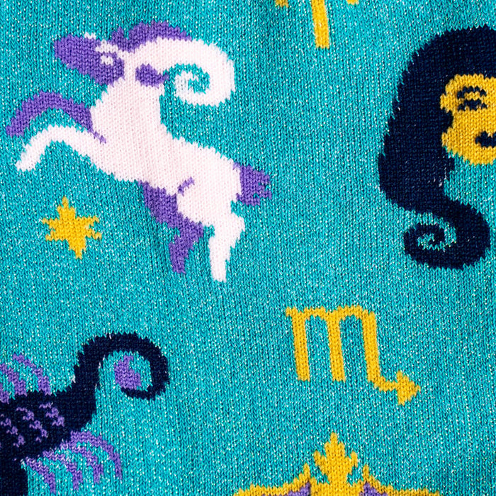 Close-up detail of the sock fabric, highlighting the vibrant colors and intricate zodiac symbols.