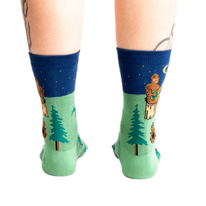 Rear view of the Sasquatch Campout socks on a model's legs.