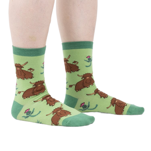 Lifestyle shot showing the socks on a person's legs, highlighting the fit and feel.