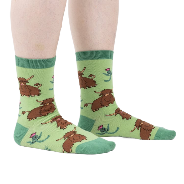 Lifestyle shot showing the socks on a person's legs, highlighting the fit and feel.