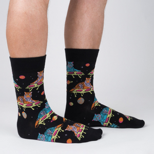 Lifestyle shot of a person wearing the 'Eye of the Tiger' socks, showcasing the design and fit.