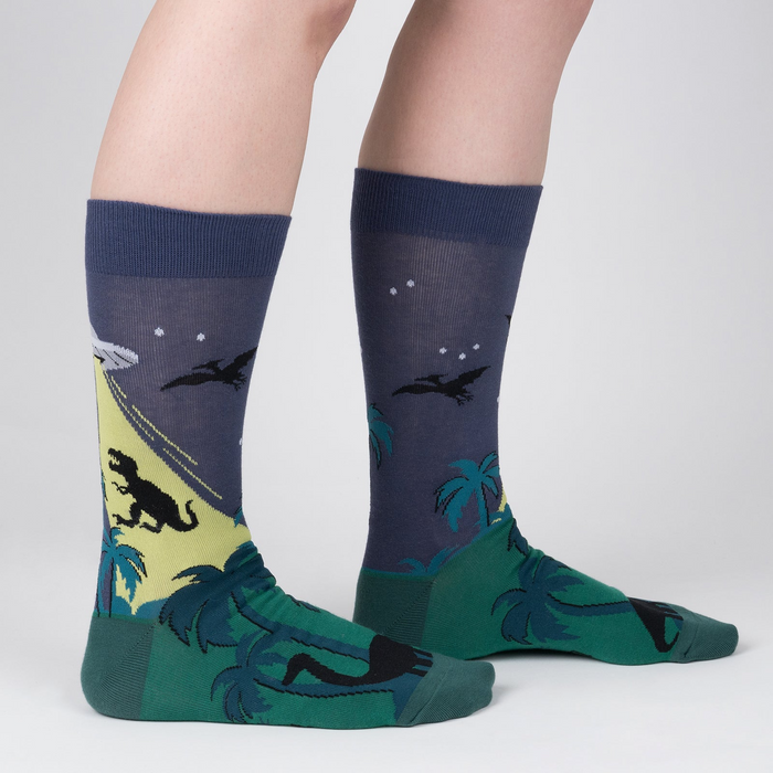 Lifestyle shot of model wearing 'See You Later' socks, showing how they look on feet.