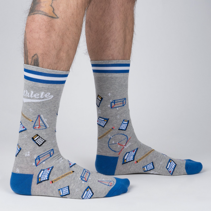 Lifestyle shot of a person wearing the Mathlete socks, showing off the fit and design.