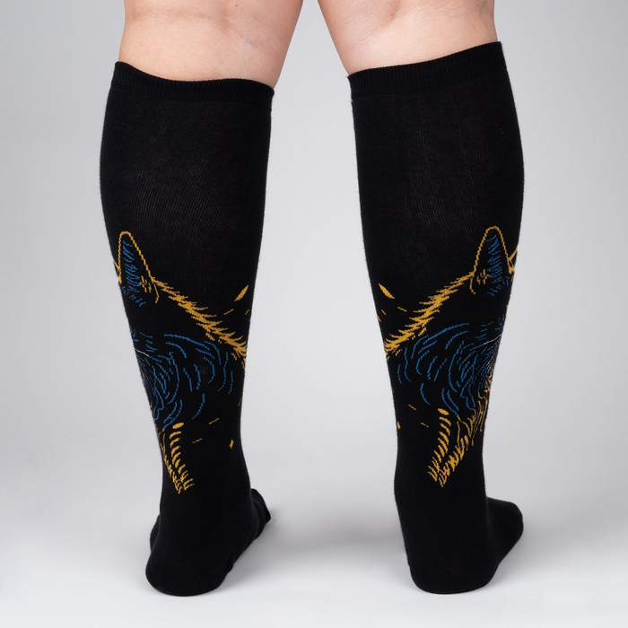 Rear view of the Night Cat socks showcasing the cat design on both socks.