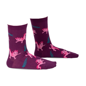 Pair of purple crew socks with a fun pattern of pink axolotls and teal ferns.