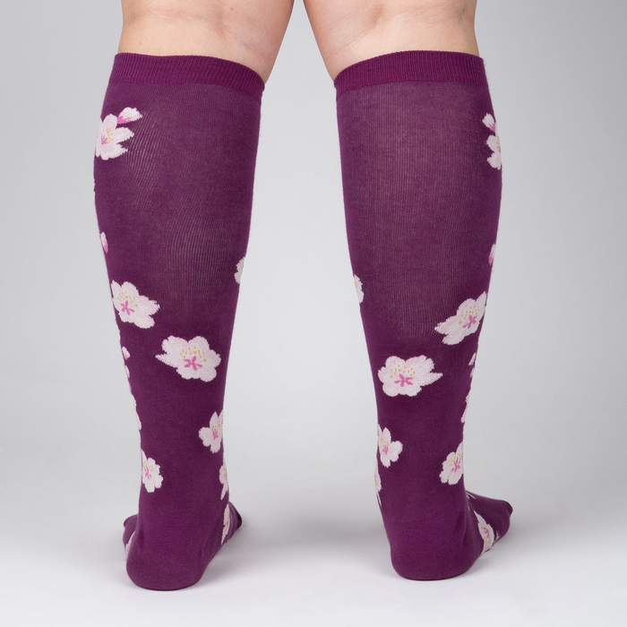 Back view of Cherry Blossom knee-high socks showing the full design.