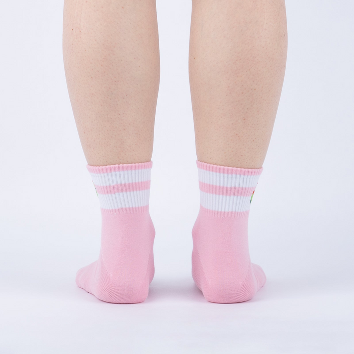 Back view of pink ankle socks featuring cute olive embroidery and white stripes.