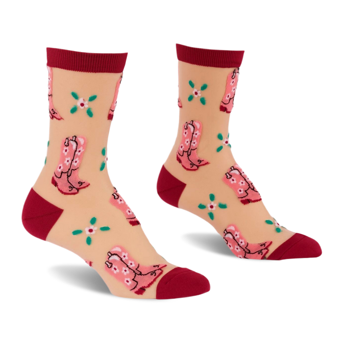 Pair of sheer ankle socks with pink cowboy boots and green clover flowers on a light beige background, with dark red cuffs, heels, and toes.
