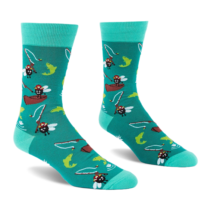 Pair of teal crew socks showing cartoon flies fly fishing from canoes with green and yellow fish leaping.