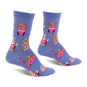 Pair of periwinkle blue crew socks with a pattern of guinea pigs in pink workout gear and headbands, lifting small weights.