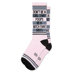 Pink crew socks with black and grey stripes, featuring text 'Don't Be A Girl That Poops Be A Bitch That Shits' on cuff.
