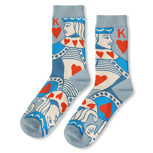 Light blue crew socks featuring a King of Hearts playing card design with bright red hearts and a large K on the top hem.