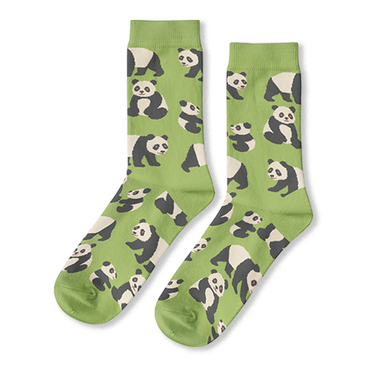 Light green crew socks featuring a repeating pattern of black and white giant pandas sitting, standing, and walking.