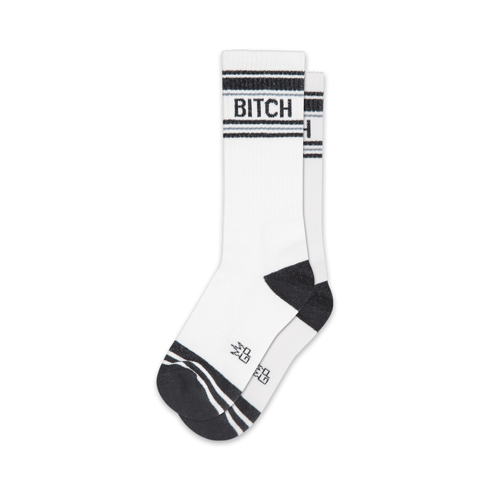 Pair of white crew socks with black stripes and the word 'BITCH' in black.