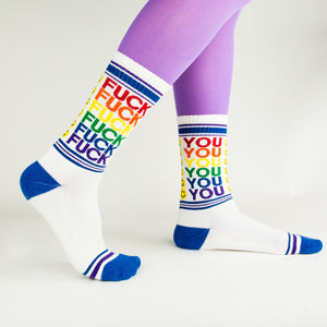 Close-up shot of 'Fuck You' socks, showcasing the detail of the design and color.