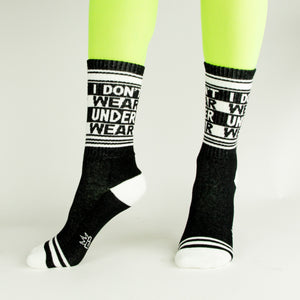 Flat lay product shot: Two 'I Don't Wear Underwear' socks laid flat, showcasing the design and details.