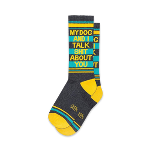 Pair of crew socks in gray, teal, and yellow. Features bold text: 'My Dog and I Talk Shit About You'.