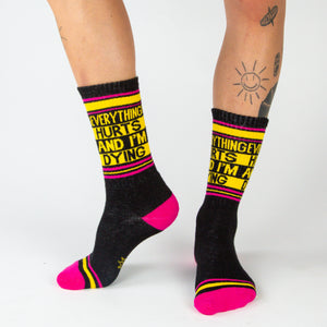 A pair of black socks with the words 