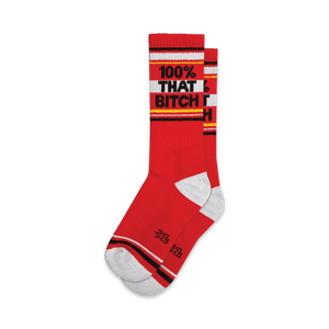 Pair of red crew socks with a white and black '100% THAT BITCH' band.  Features grey and black accents at the cuffs.