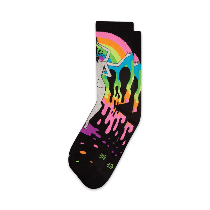 A pair of black crew socks featuring a vibrant rainbow design, a melting figure, and dripping paint splatters.