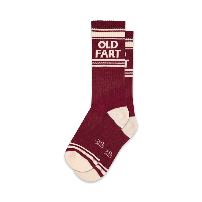 Pair of maroon crew socks with off-white stripes and 'OLD FART' text.  Retro design.