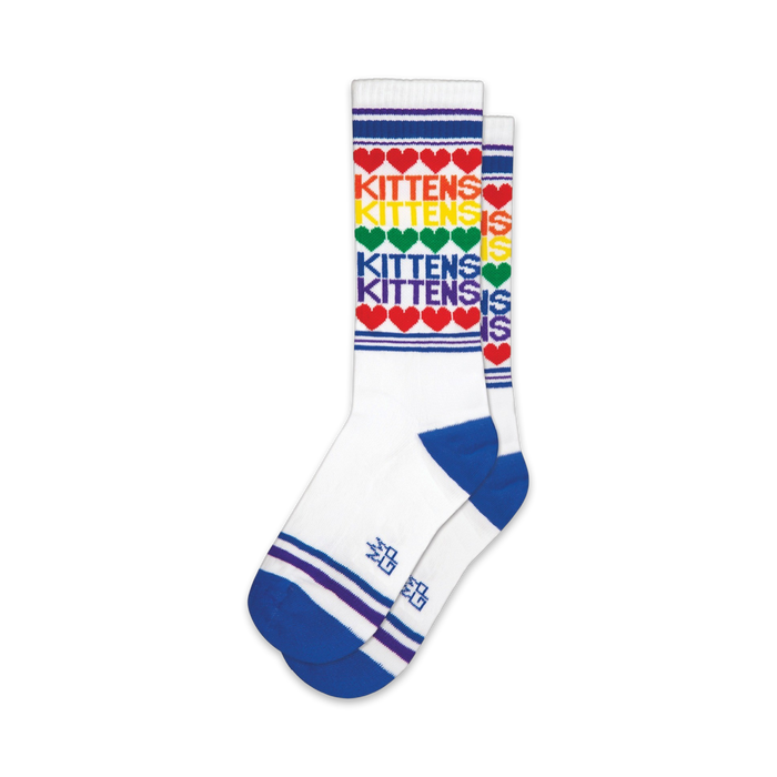 Pair of white crew socks with rainbow hearts and 'Kittens' text. Blue cuffs and stripes add a pop of color.