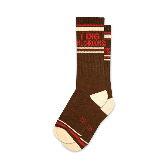 Pair of brown crew socks with red and white stripes and the text 'I Dig Mushrooms'.