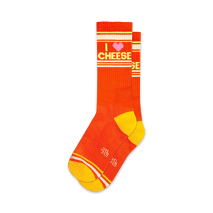 Pair of orange crew socks with yellow stripes and an 'I love cheese' graphic. Pink heart detail.