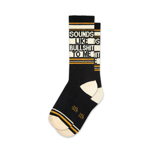 Pair of black crew socks with gold and white stripes and the phrase 'Sounds Like Bullshit To Me' printed vertically.