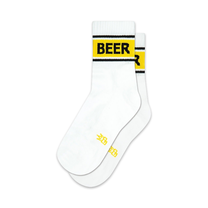 Pair of white crew socks with a black and yellow 'BEER' band at the top. Small yellow design at the heel.