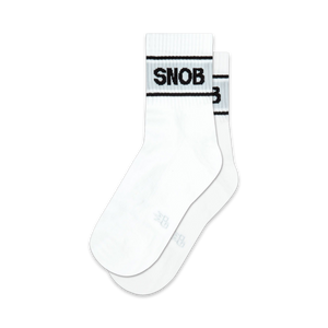 Pair of white ankle socks with a black 'Snob' logo across the top. Simple, stylish, and perfect for everyday wear.