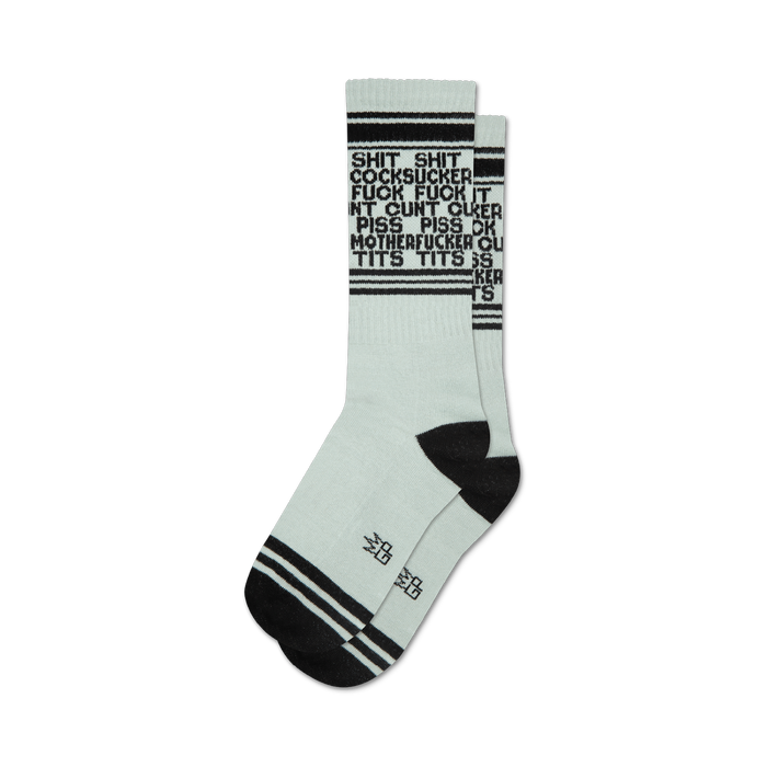 Pair of light teal crew socks with black stripes and repeated expletives printed vertically.