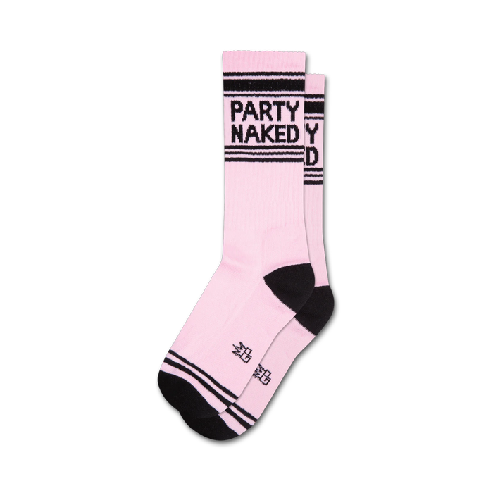 Pair of pink crew socks with black stripes and the phrase 'PARTY NAKED' printed on them. }}