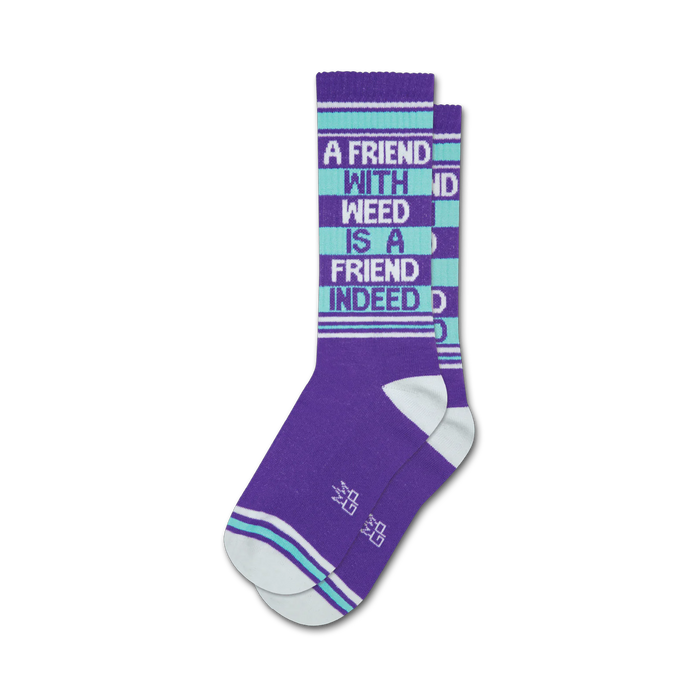 Pair of purple crew socks with teal stripes and the phrase 'A Friend With Weed Is A Friend Indeed' in white. }}