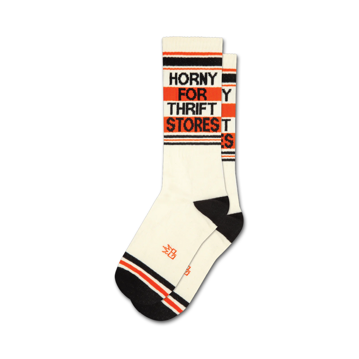 Pair of off-white crew socks with black and orange stripes. Text 'Horny For Thrift Stores' is vertically stacked on the socks. }}