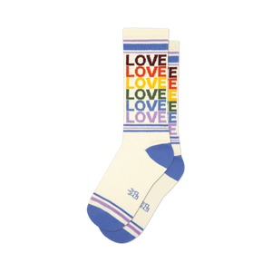 Cream crew socks with rainbow colored 'LOVE' text and purple, white stripes.