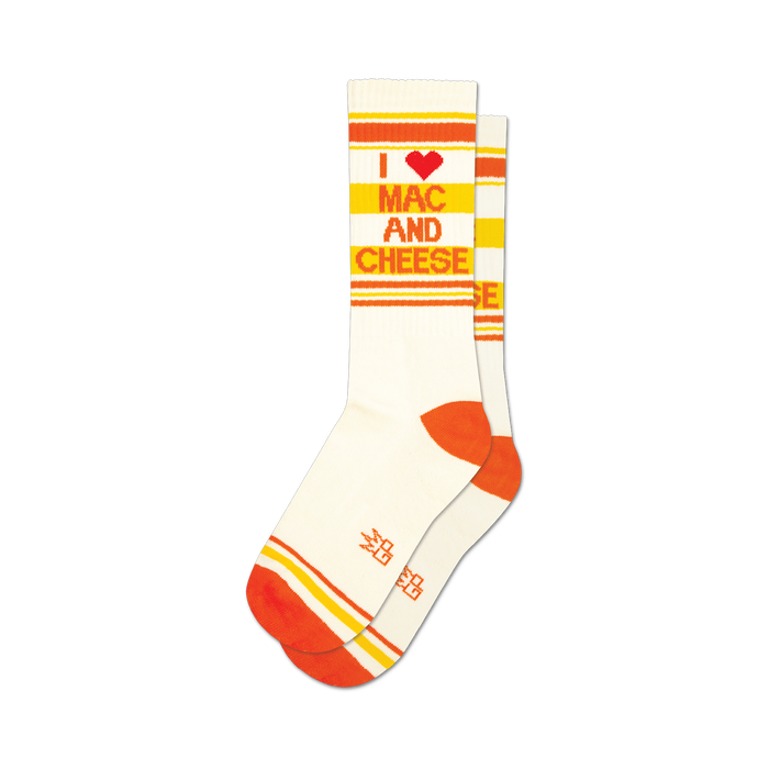 Pair of white crew socks with orange and yellow stripes and the text 'I heart Mac and Cheese'. }}
