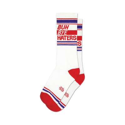 A pair of white crew socks with red and purple stripes and the words 'BUH BYE HATERS' printed on the leg.