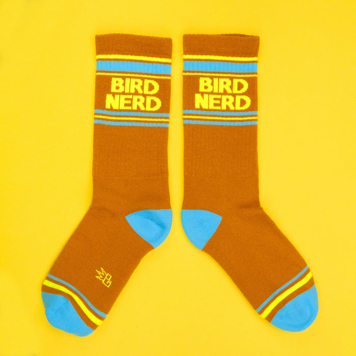 Another flat lay showing both Bird Nerd socks.