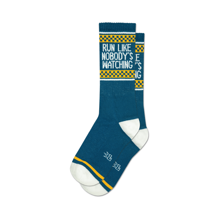 Pair of teal crew socks with yellow and white checkerboard stripes at the top and the phrase 'Run Like Nobody's Watching' in white text. }}