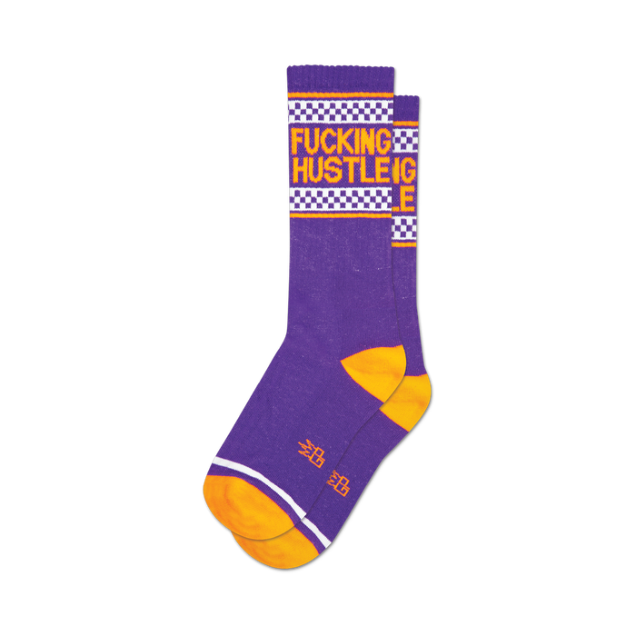 Pair of purple crew socks with orange and white accents. Features a 'Fucking Hustle' graphic and a checkered racer stripe. }}