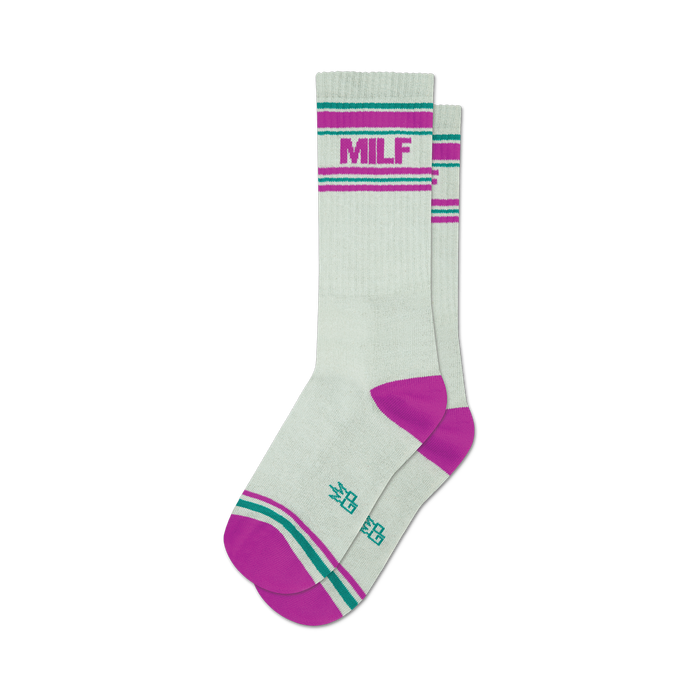 Pair of off-white crew socks with fuchsia and teal stripes. 'MILF' is printed on the socks in fuchsia. }}