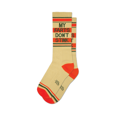 Pair of beige crew socks with orange and green stripes and the phrase 'My Farts Don't Stink' in dark text.