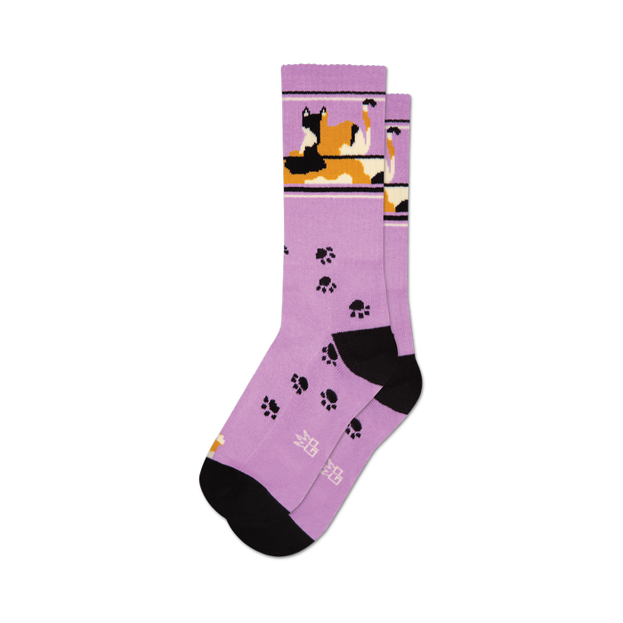 Lavender crew socks featuring a calico cat design and black paw prints. Black heel and toe. }}