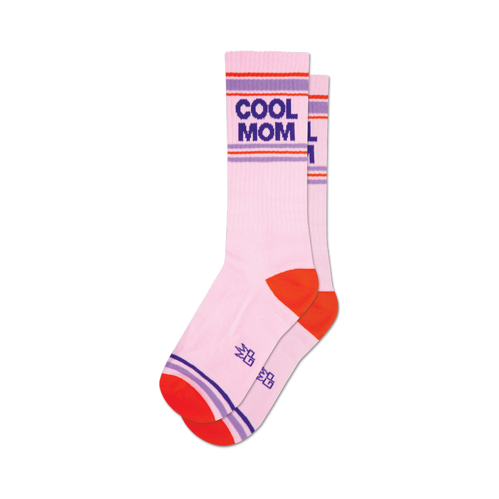 Pair of pink crew socks with 'Cool Mom' in purple text and orange, purple, and white stripes around the top and heel. }}