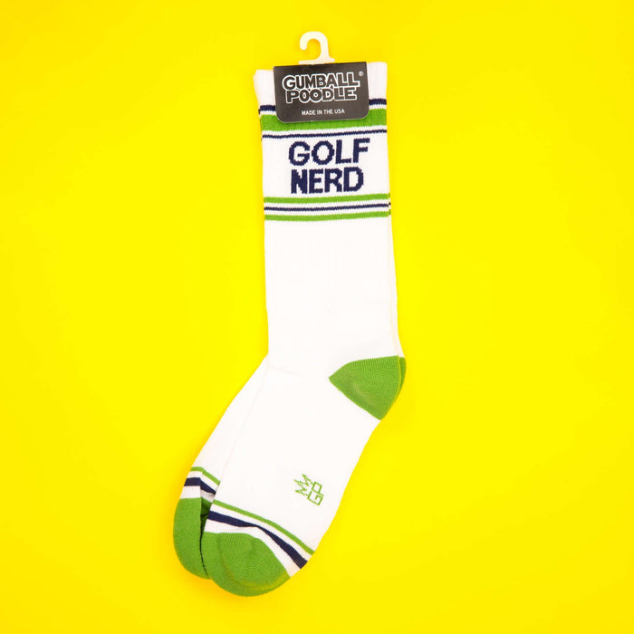 Golf Nerd socks displayed on a hanger against a yellow background.