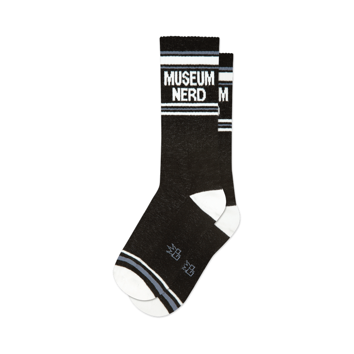 Pair of black crew socks with white and grey stripes and 'Museum Nerd' text.  Fun, retro design.