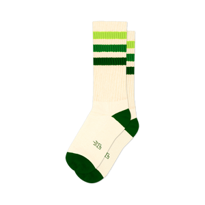 Pair of off-white crew socks with green and lime green stripes, and dark green cuffs.  Features a small logo.