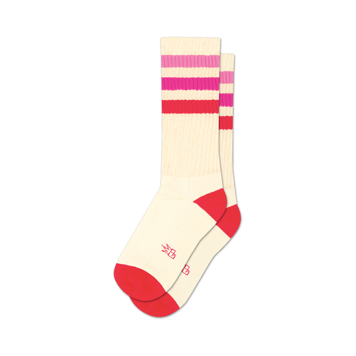 Pair of cream crew socks with pink and red horizontal stripes and red cuffs.