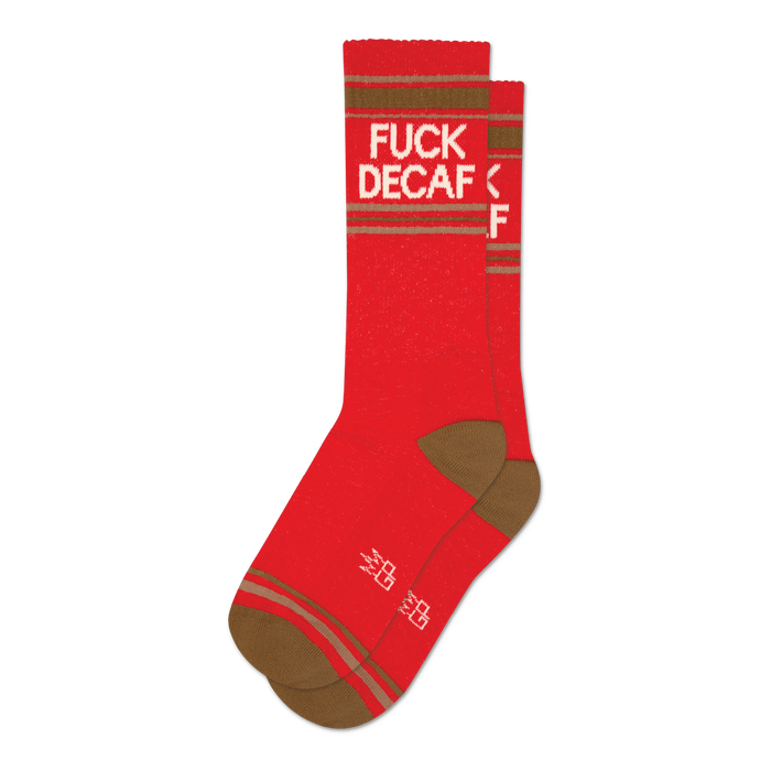 Pair of red crew socks with brown stripes and the phrase 'Fuck Decaf' in white text. }}